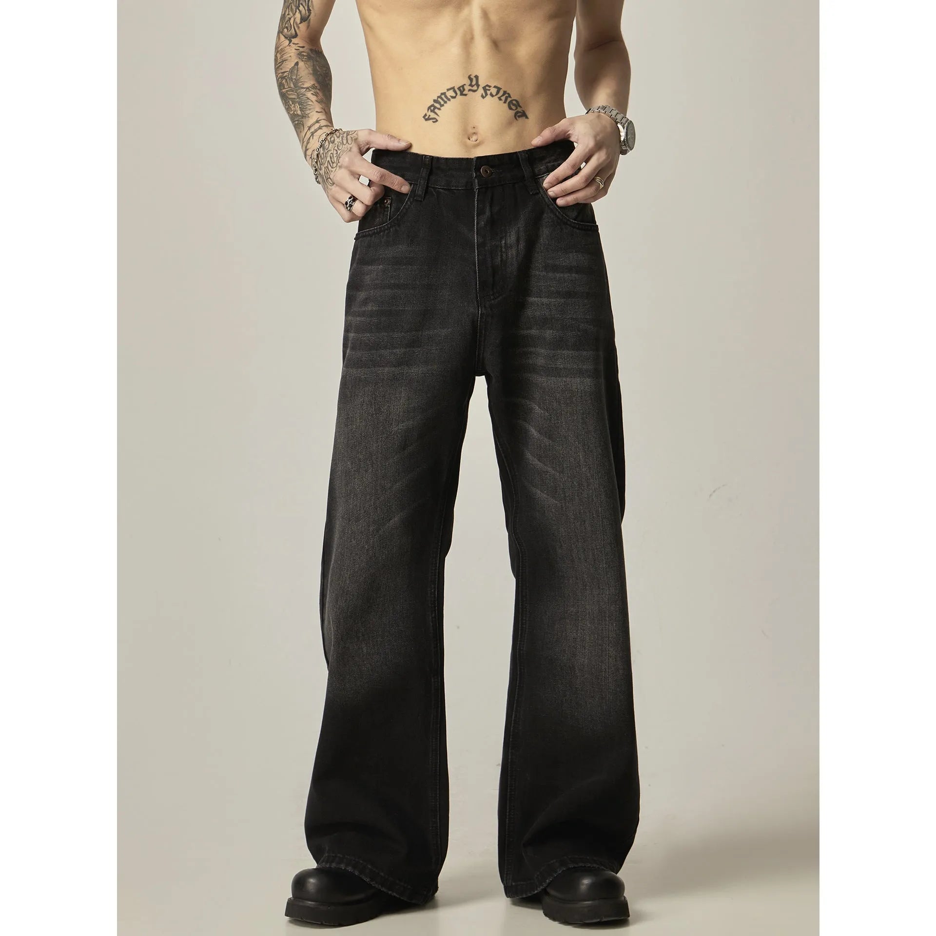 Black loose straight-leg American retro jeans with zipper fly on mannequin