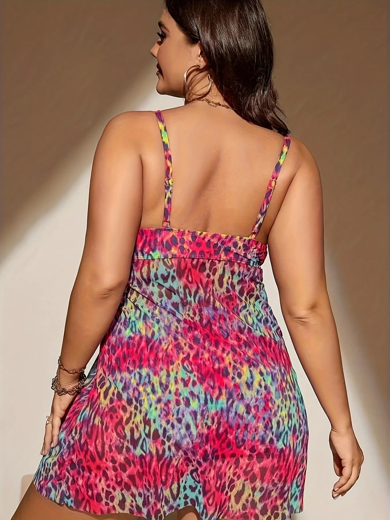 Plus size women's bikini set with split skirt design in red, rose red, blue, and purple colours