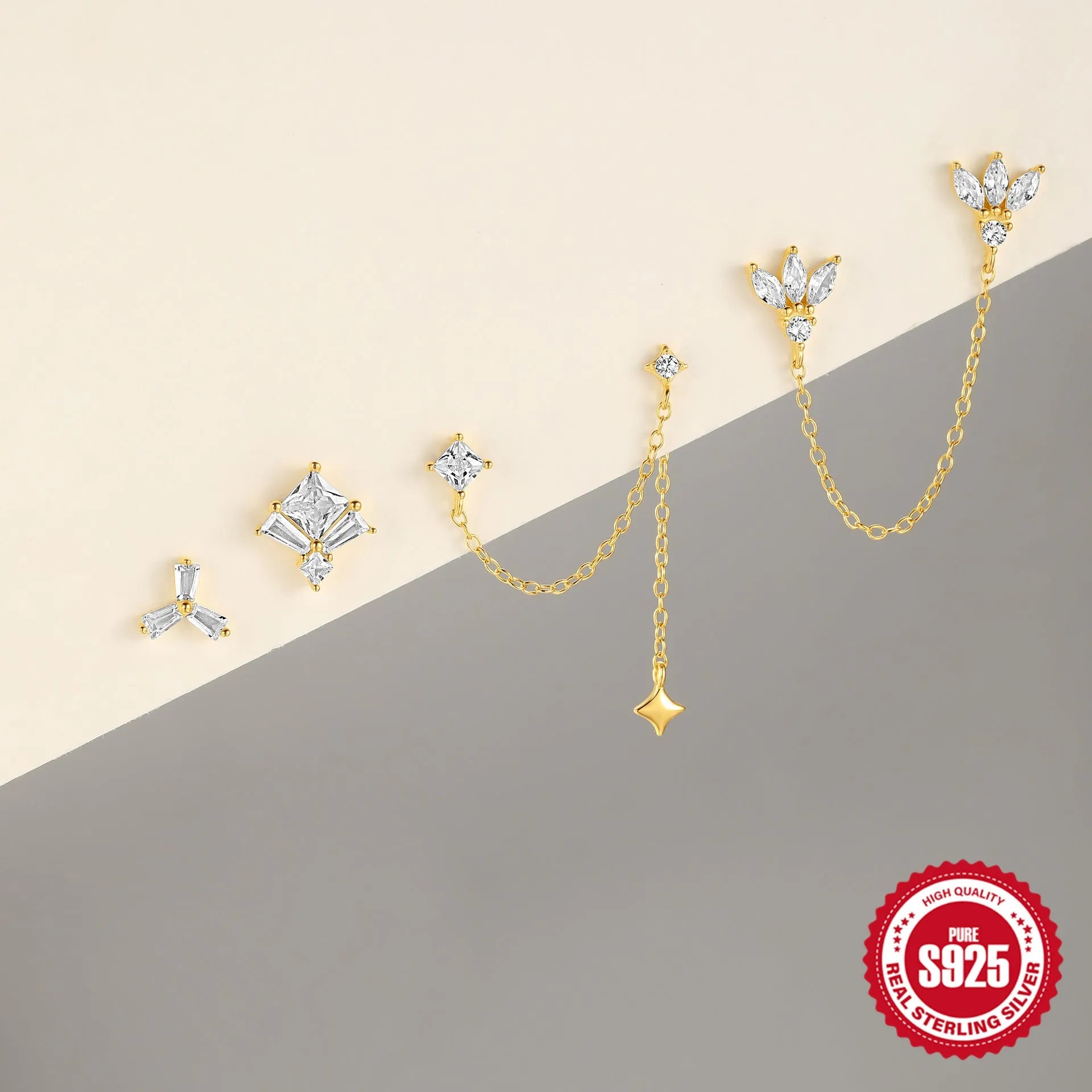 Sterling silver chain stud earrings with zircon inlay in geometric shapes including clover and crown designs
