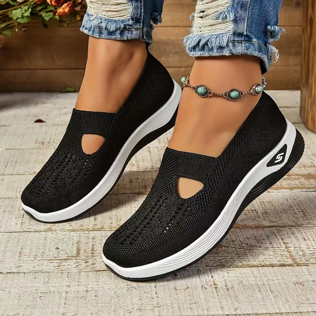 Casual mesh walking shoes with T-strap in multiple colours on a soft PVC sole.