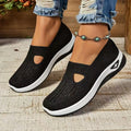 Casual mesh walking shoes with T-strap in multiple colours on a soft PVC sole.