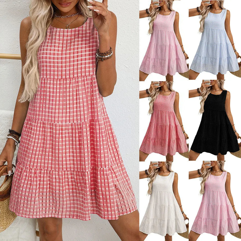 Women's loose sleeveless plaid dress with an oversized swing skirt and high waist.