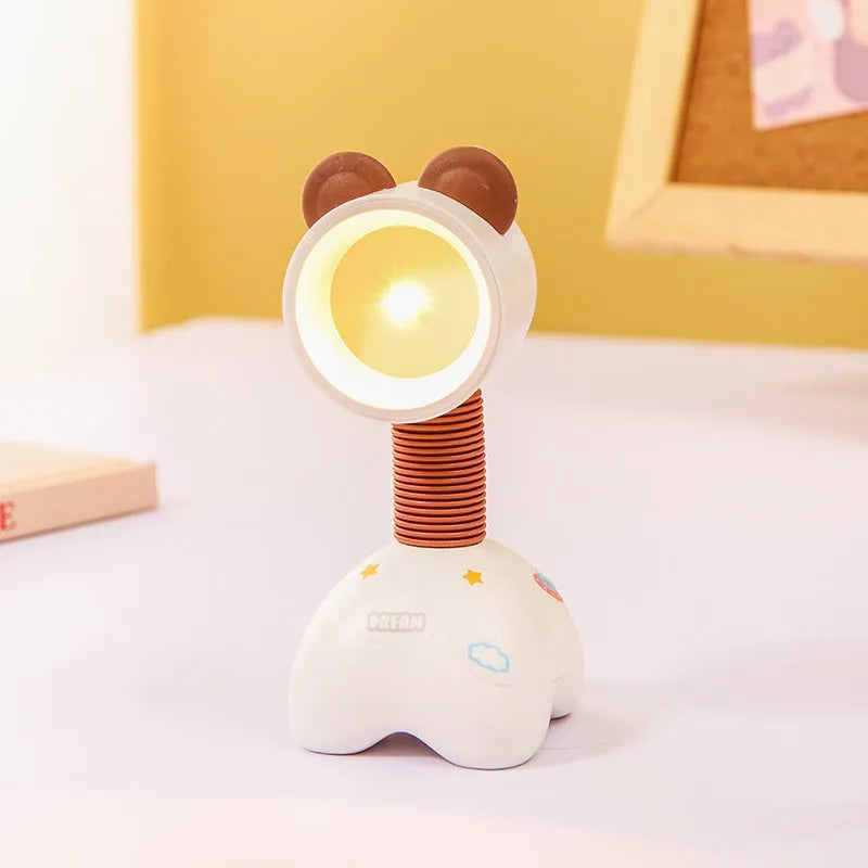 DIY magnetic cartoon small night lamp with multi-angle adjustable lighting on desktop