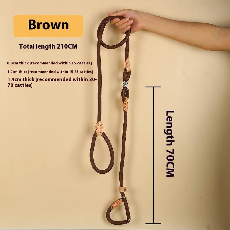 Brown nylon P chain dog leash held in a hand, showing its full 2.1 metre length.