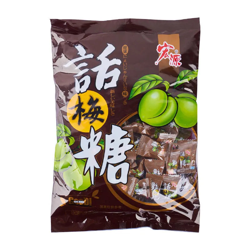 Three bags of Asian fruit hard candy: plum sugar, guava, and tangerine peel varieties with weight labels