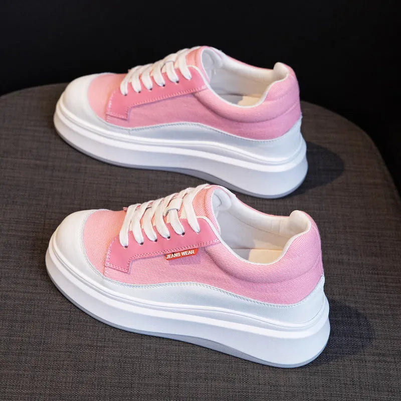 Beige and pink women's leather board shoes with thick soles shown from the side.