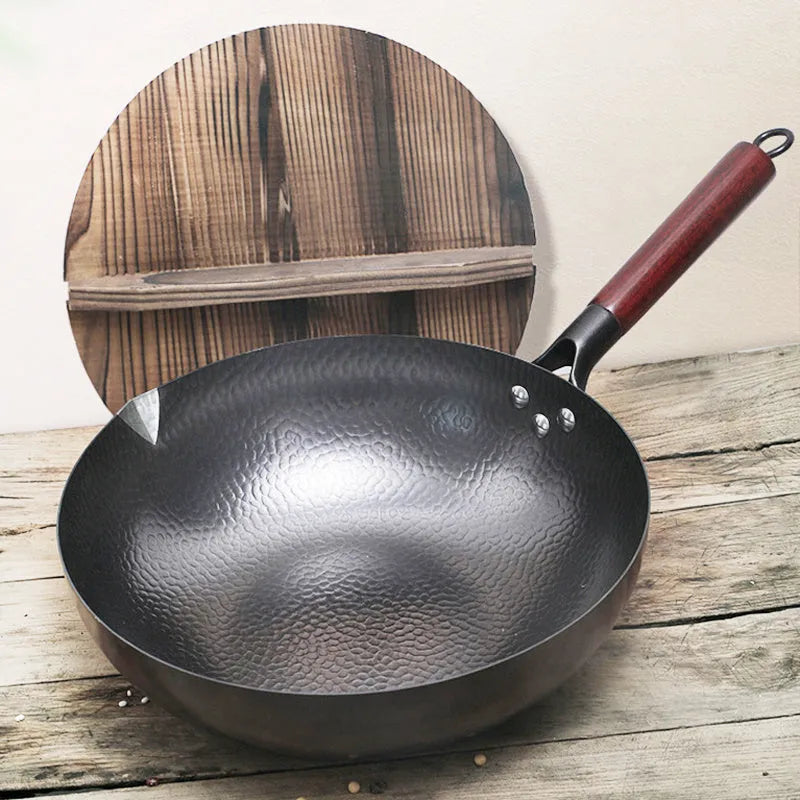 Traditional black iron wok with wooden handle, 32cm diameter