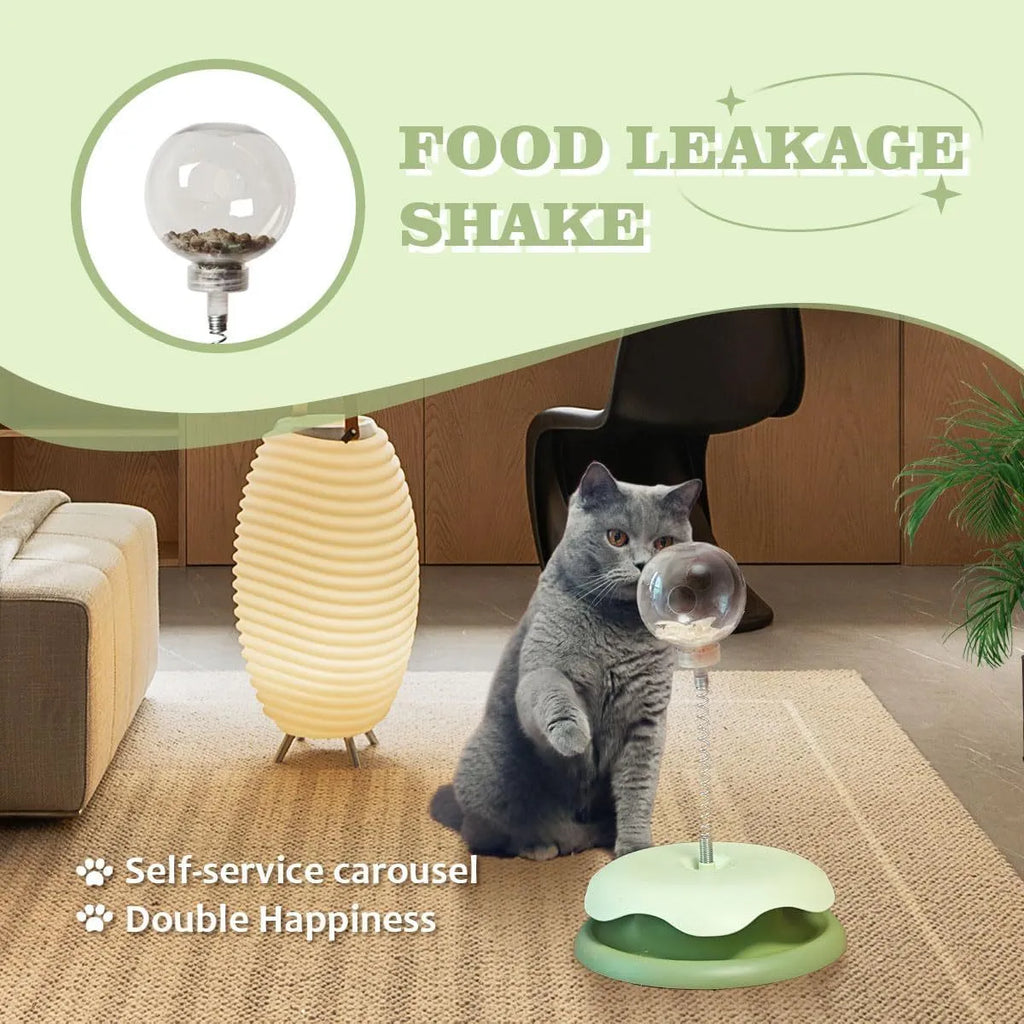 Blue and green interactive cat treat dispenser toy with track ball slow feeder design