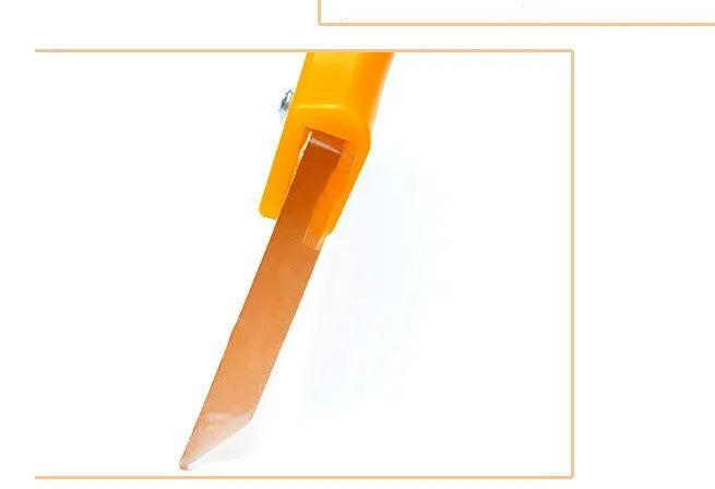 Yellow plastic car snow shovel for ice removal, 32cm length, on a dark background