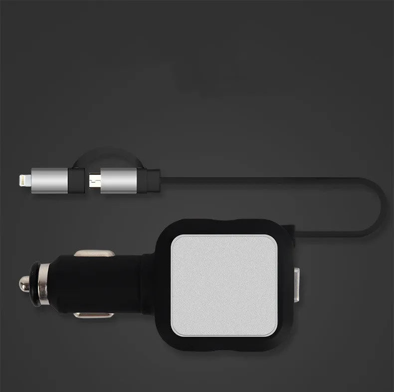Black and gold dual USB car charger with retractable cable shown plugged into vehicle power socket