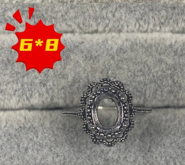 Oval denier ring with open mouth design and five-pointed star decoration on copper band
