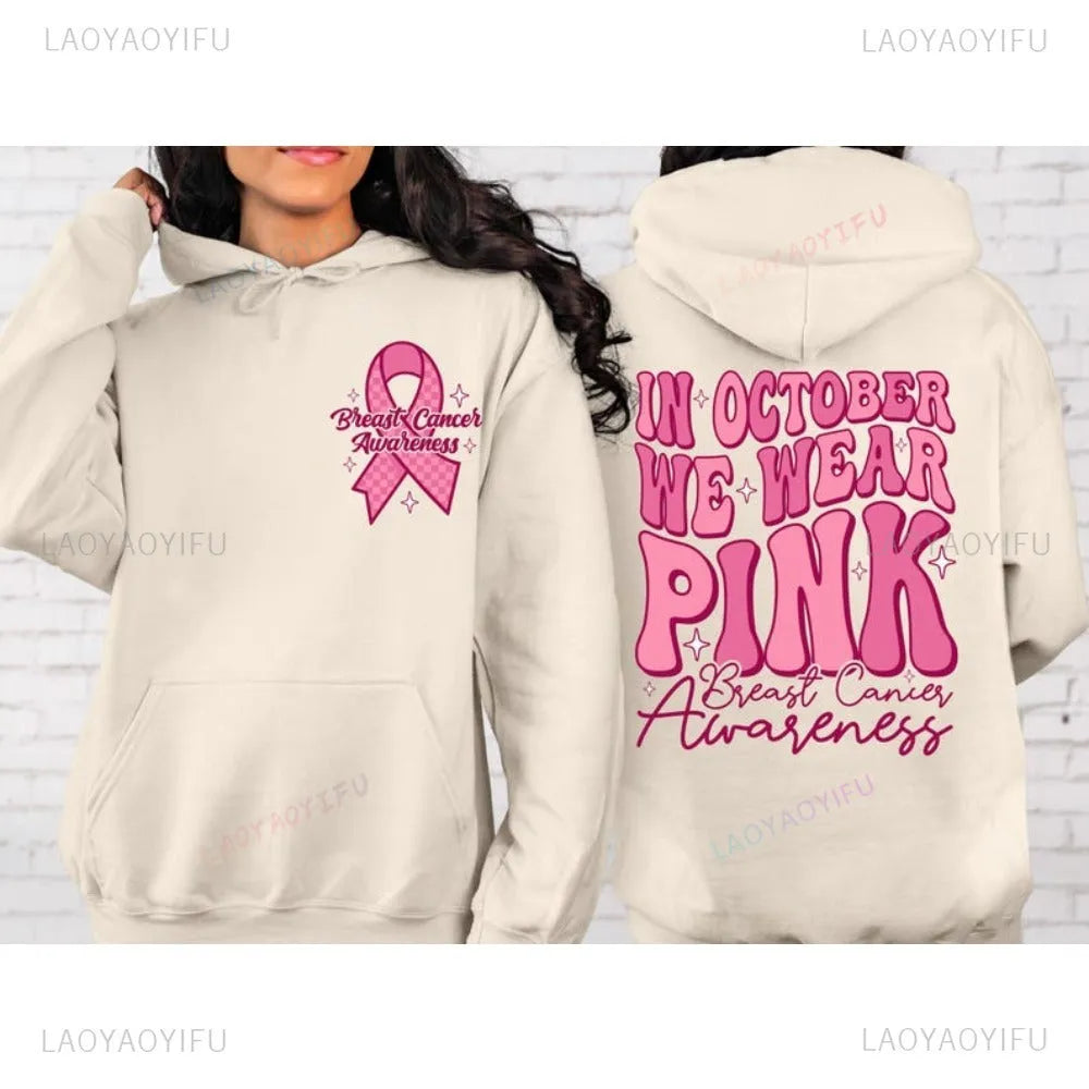 Retro print breast cancer awareness pullover hoodie with side seam pockets in pink.
