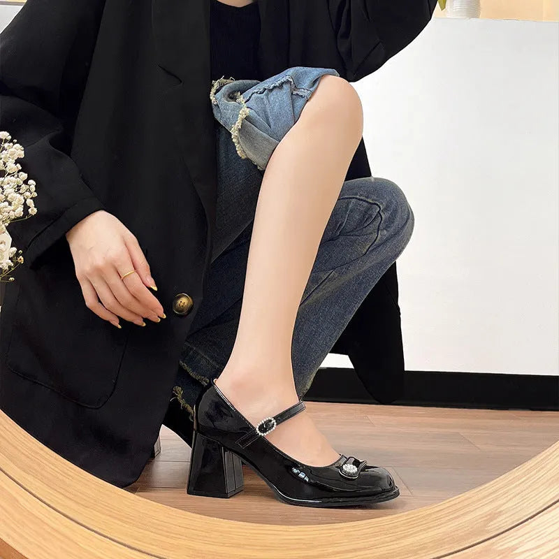 Women's black patent leather chunky heel round toe shoes for wide feet.