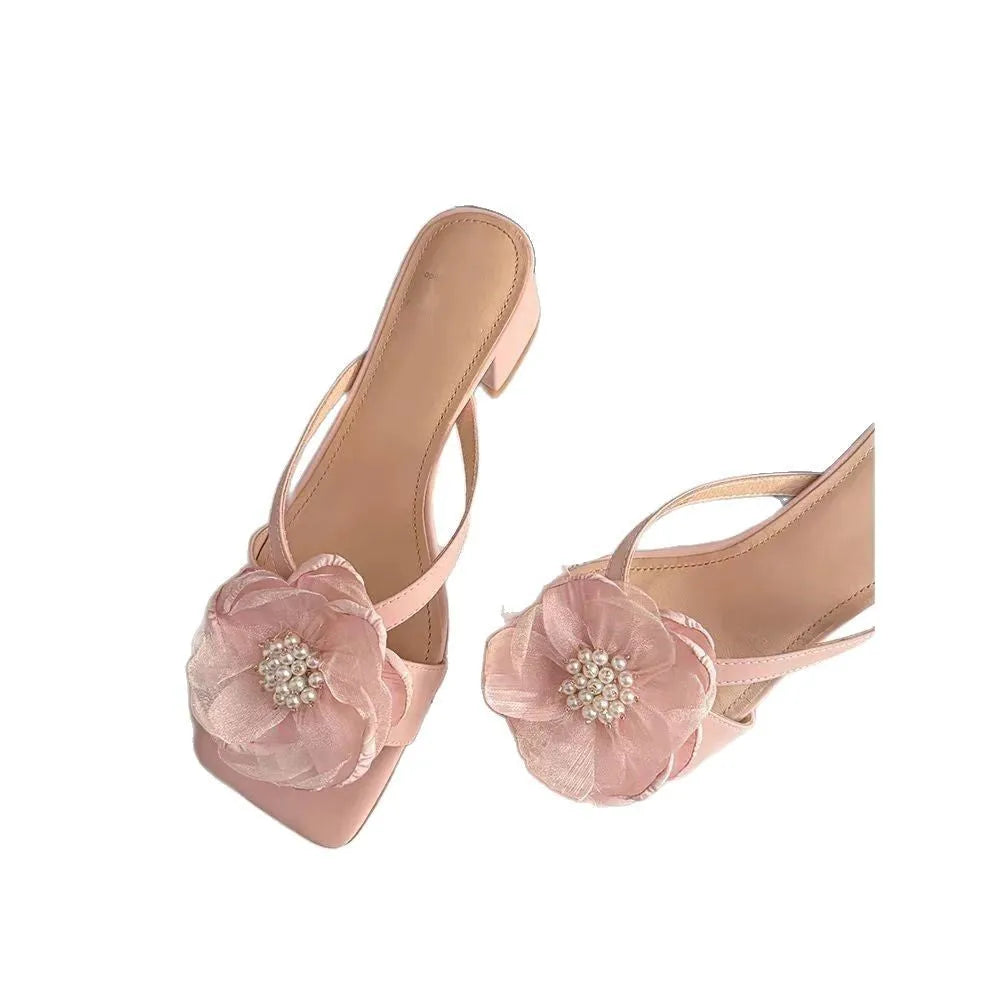 Women's cream white chunky heel sandals with square toe and single satin strap on a rubber sole.