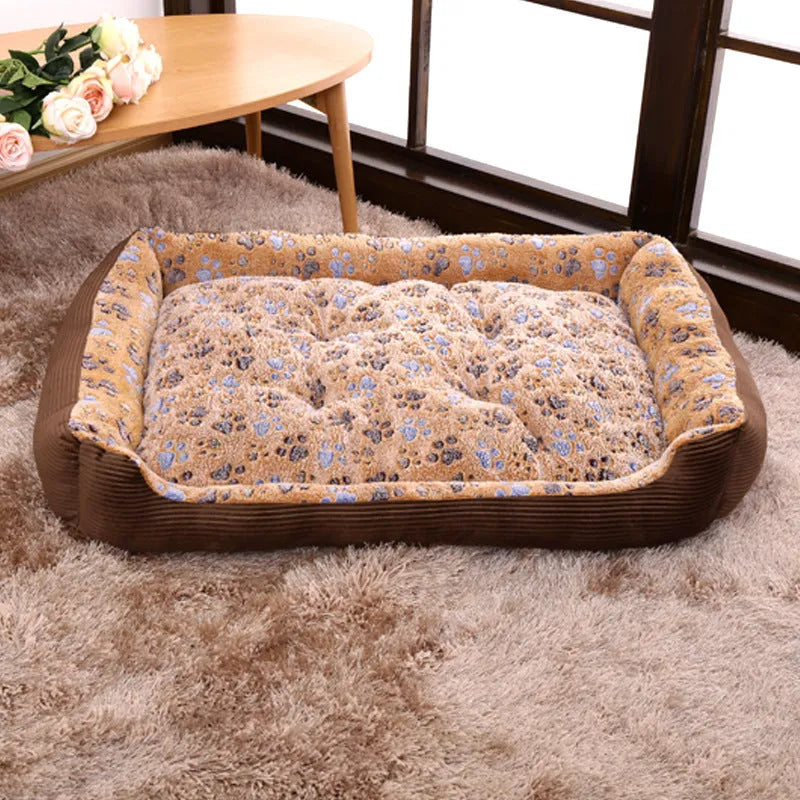 Beige plush sofa-style dog bed with raised sides for a small dog