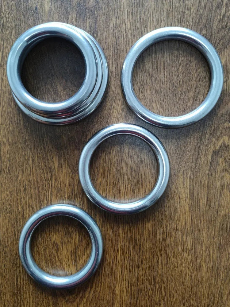 Iron Arm Skill Wing Chun carbon steel power training ring for martial arts grip strength.