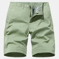 Men's loose-fit straight-leg denim shorts in a printed blue colour, shown laid flat.