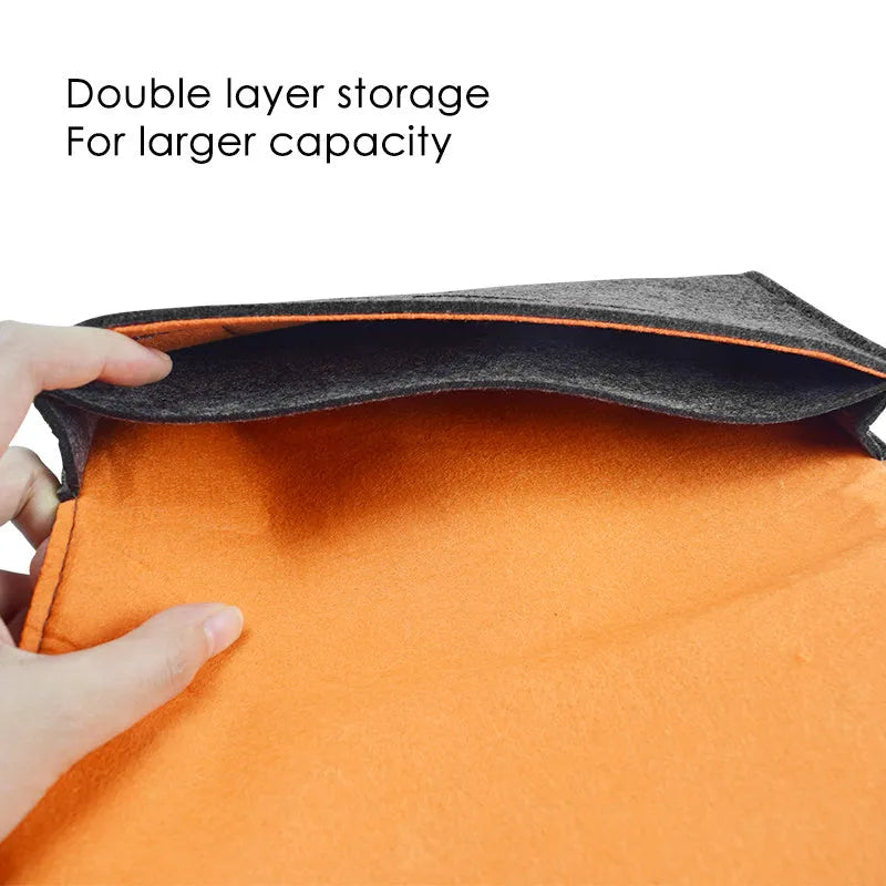 Black felt pouch for Nintendo Switch console with game card slots and double storage layer.