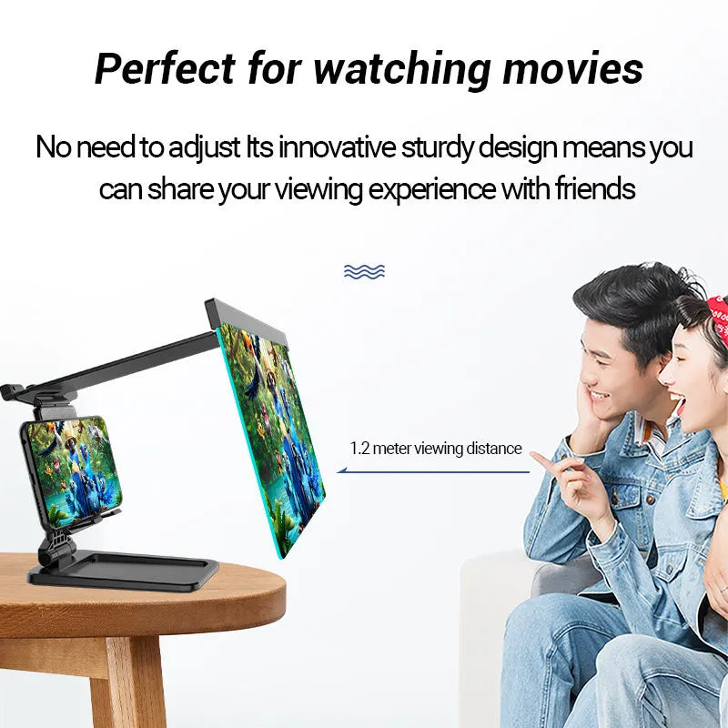 Black 12-inch mobile phone screen amplifier with detachable phone holder on desktop