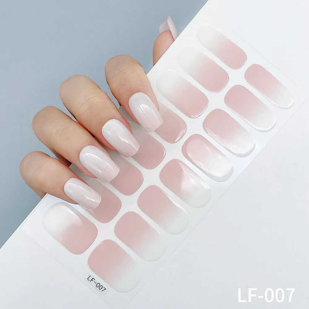 16 solid colour full nail art stickers with 22 patterns including cross, rose, butterfly designs in 12x6mm oval size