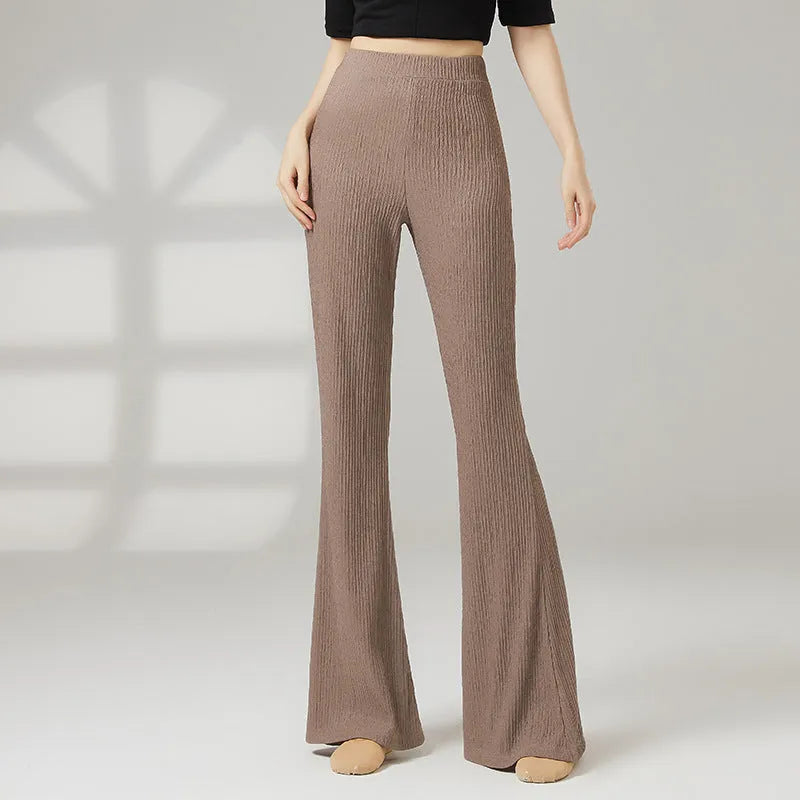 Women's solid colour stretch polyester dance practice pants for ballet and sports dance training.