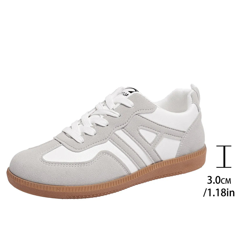 Women's retro colour matching lace-up jogging shoes in grey with a round toe and platform sole.
