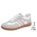 Women's retro colour matching lace-up jogging shoes in grey with a round toe and platform sole.