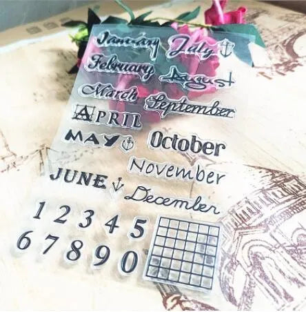 Close-up of a transparent silicone vintage calendar seal stamp showing a digital table icon design.