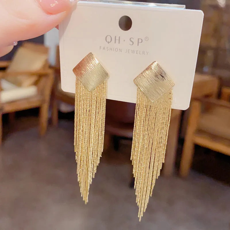 Pair of geometric tassel earrings with electroplated copper finish and real gold colour retention, simple style for women