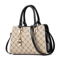 Women's geometric pattern PU messenger bag with zipper closure showing internal card slots and organisation pockets