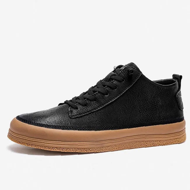 Men's black casual leather shoes with round toe, flat heel, and lace-up front on a white background.