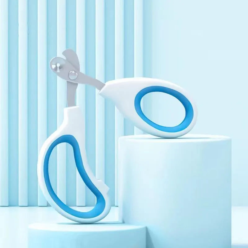 Blue cat nail clippers with a circular guard hole and cushioned non-slip handles on a white background.