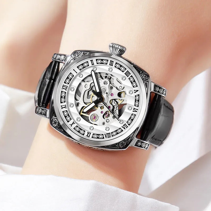 Men's mechanical watch with luminous hands on a leather strap, showing black, red, steel, and white colour options.