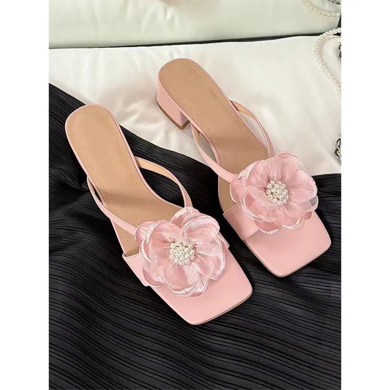Women's cream white chunky heel sandals with square toe and single satin strap on a rubber sole.