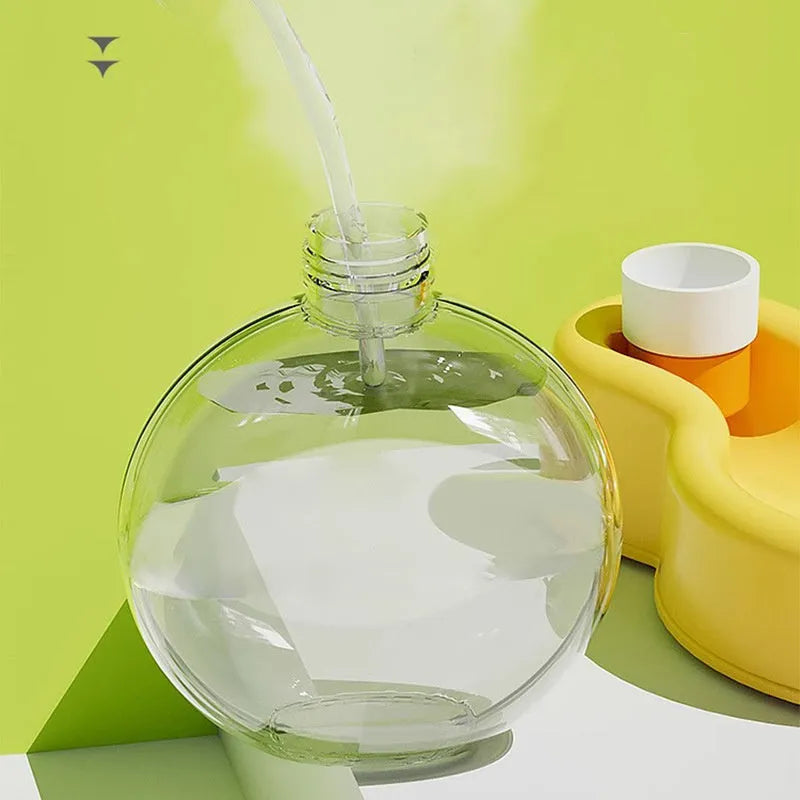 Green dog travel water bottle with built-in silicone drinking bowl, shown with bowl extended.