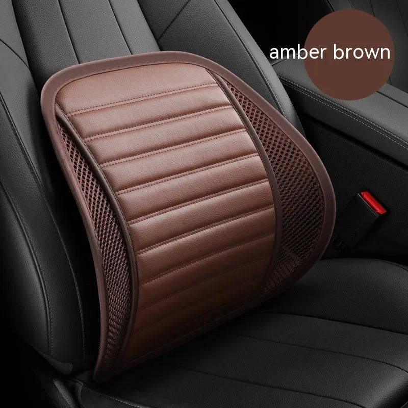 Leather lumbar support cushion with removable memory foam pad in sapphire blue colour on a car seat.