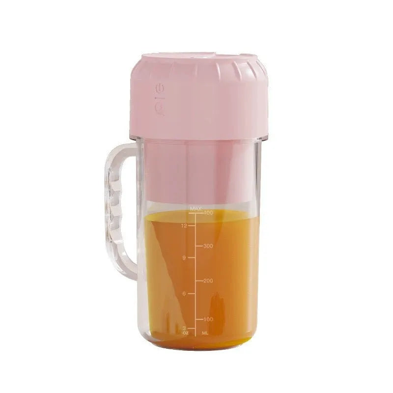 Portable USB juicer in avocado green or cherry blossom pink with multiple blade options for household use