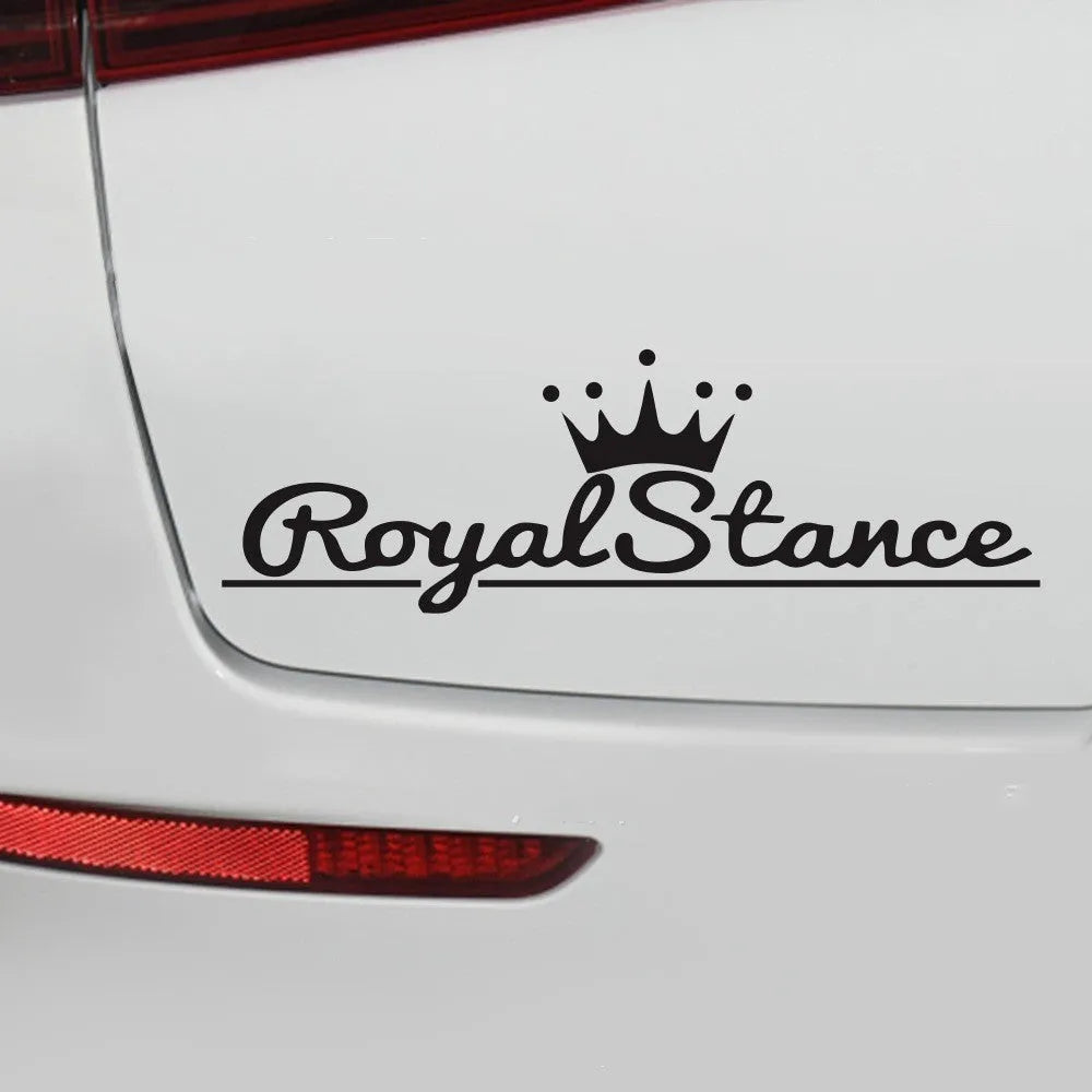 Reflective colourful crown car sticker on vehicle window, 30 by 12 cm.