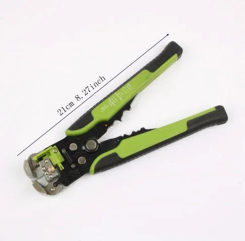 Yellow automatic 3-in-1 wire stripper and crimper tool for electrical cables on a workbench.