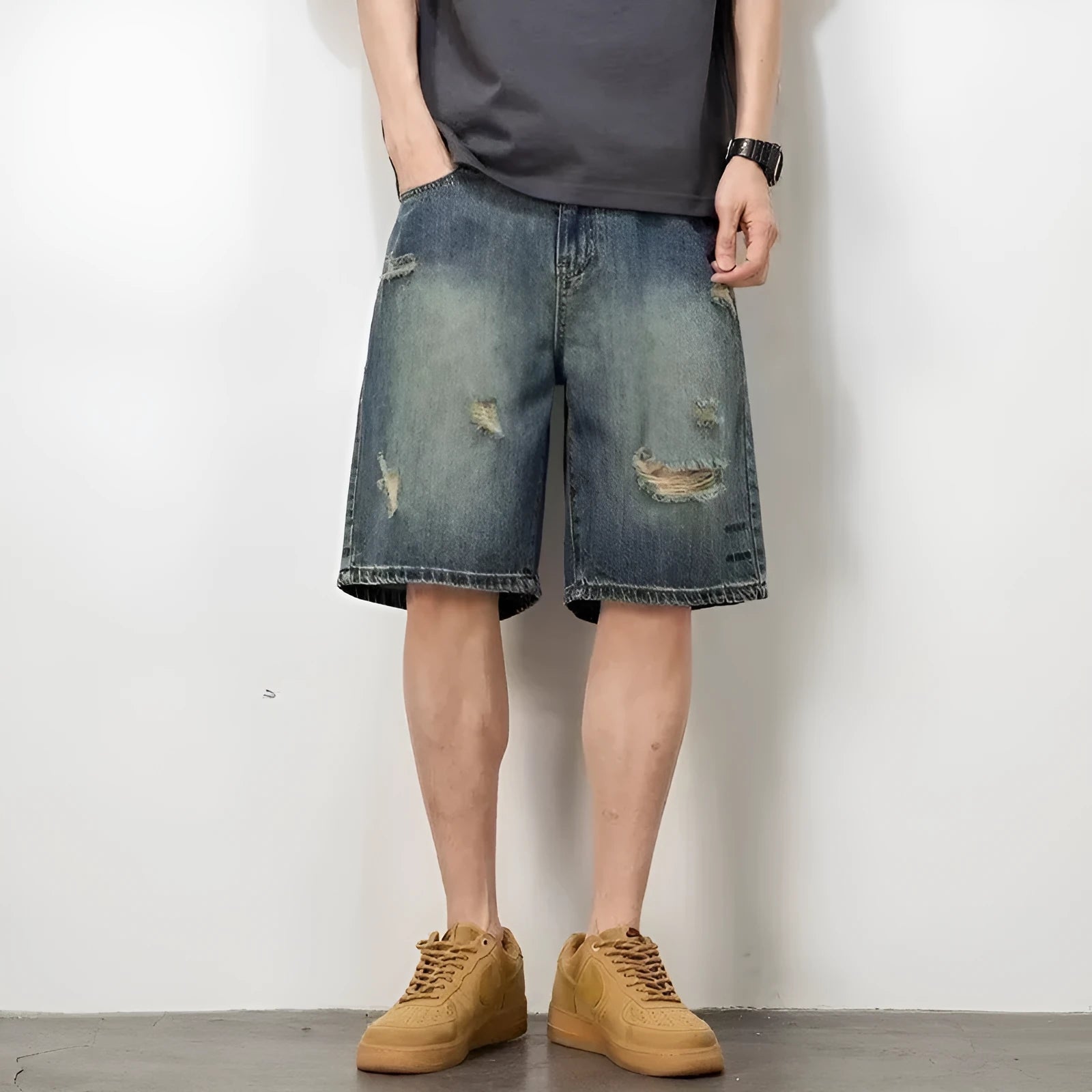 Men's blue retro loose hole denim shorts with straight leg fit