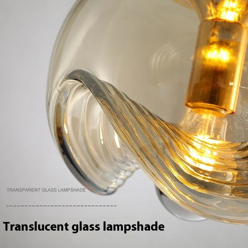 Modern minimalist glass pendant chandelier with a 250mm frosted shade in a transparent light colour.