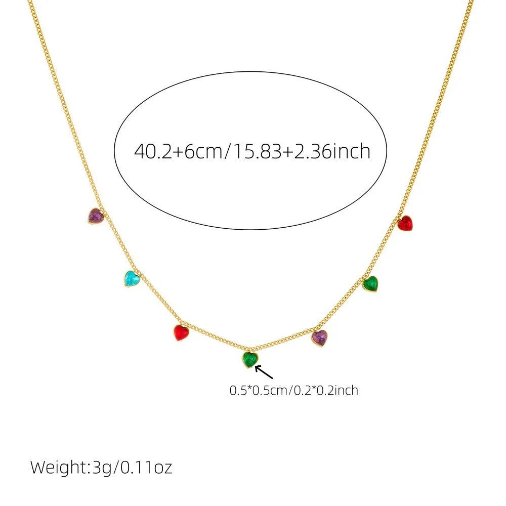 Gold heart pendant necklace on a stainless steel chain with adjustable length.