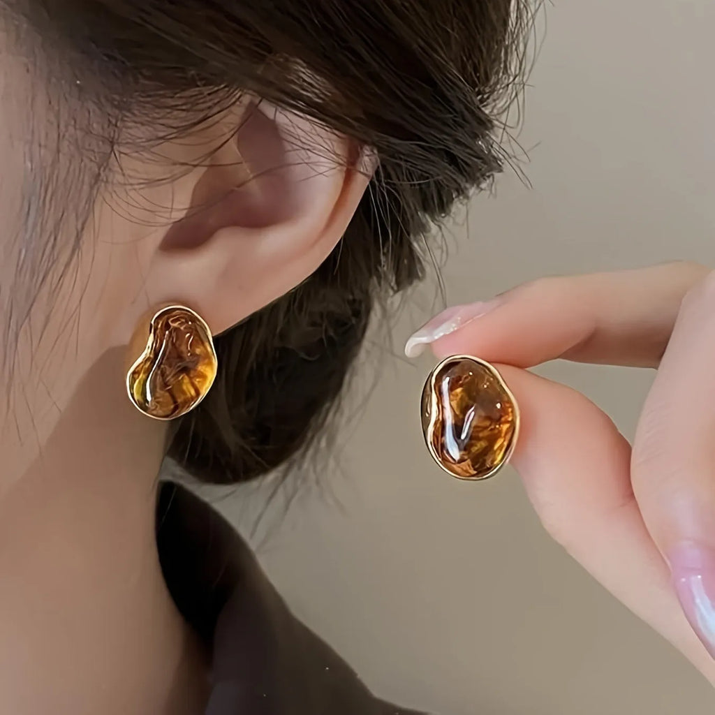 Handmade geometric alloy earrings with tassel elements in three holiday styles