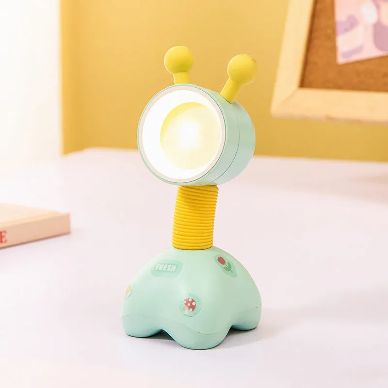 DIY magnetic cartoon small night lamp with multi-angle adjustable lighting on desktop