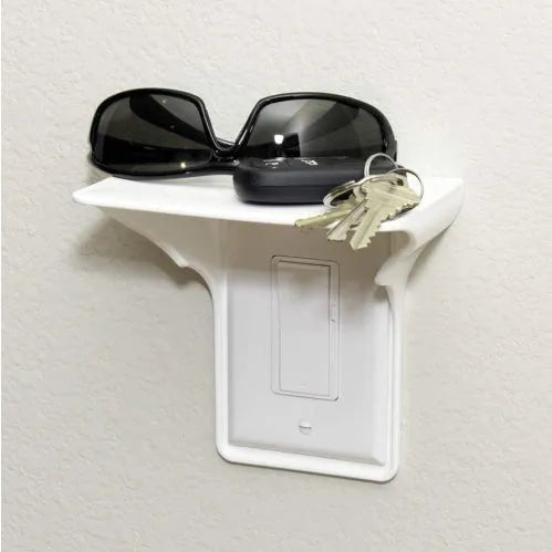 White plastic socket storage rack for tool organisation, 14 cm wide by 15 cm tall.
