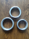 Iron Arm Skill Wing Chun carbon steel power training ring for martial arts grip strength.