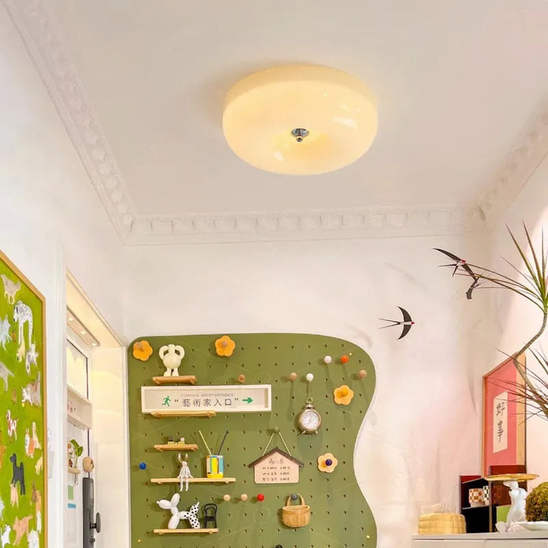 Cream American-style bedroom ceiling lamp with three-colour light mounted centrally