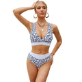 Leopard print women's bikini swimsuit with V-neck split design and cross banded construction