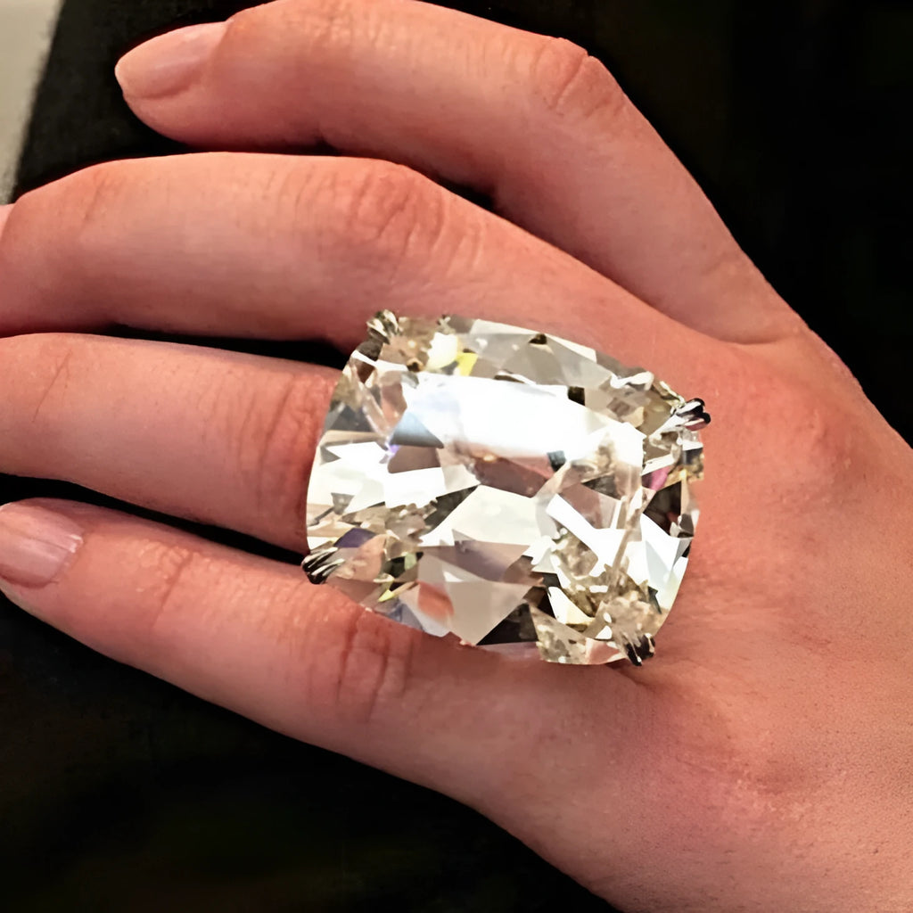 Simple geometric women's ring with white gold colour finish and inlaid square diamond design