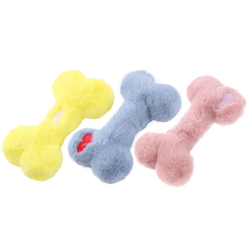 Blue love bone shaped dog plush toy with a squeaker, shown next to pink and yellow colour options.